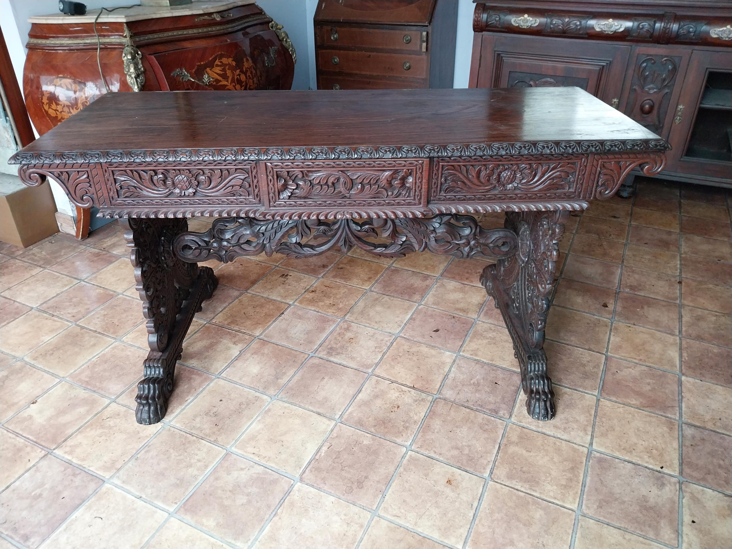 19th C. carved rosewood Oriental centre table with single drawer in frieze decorated with