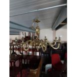 Brass eight branch chandelier {70 cm H x 52 cm Dia.}.