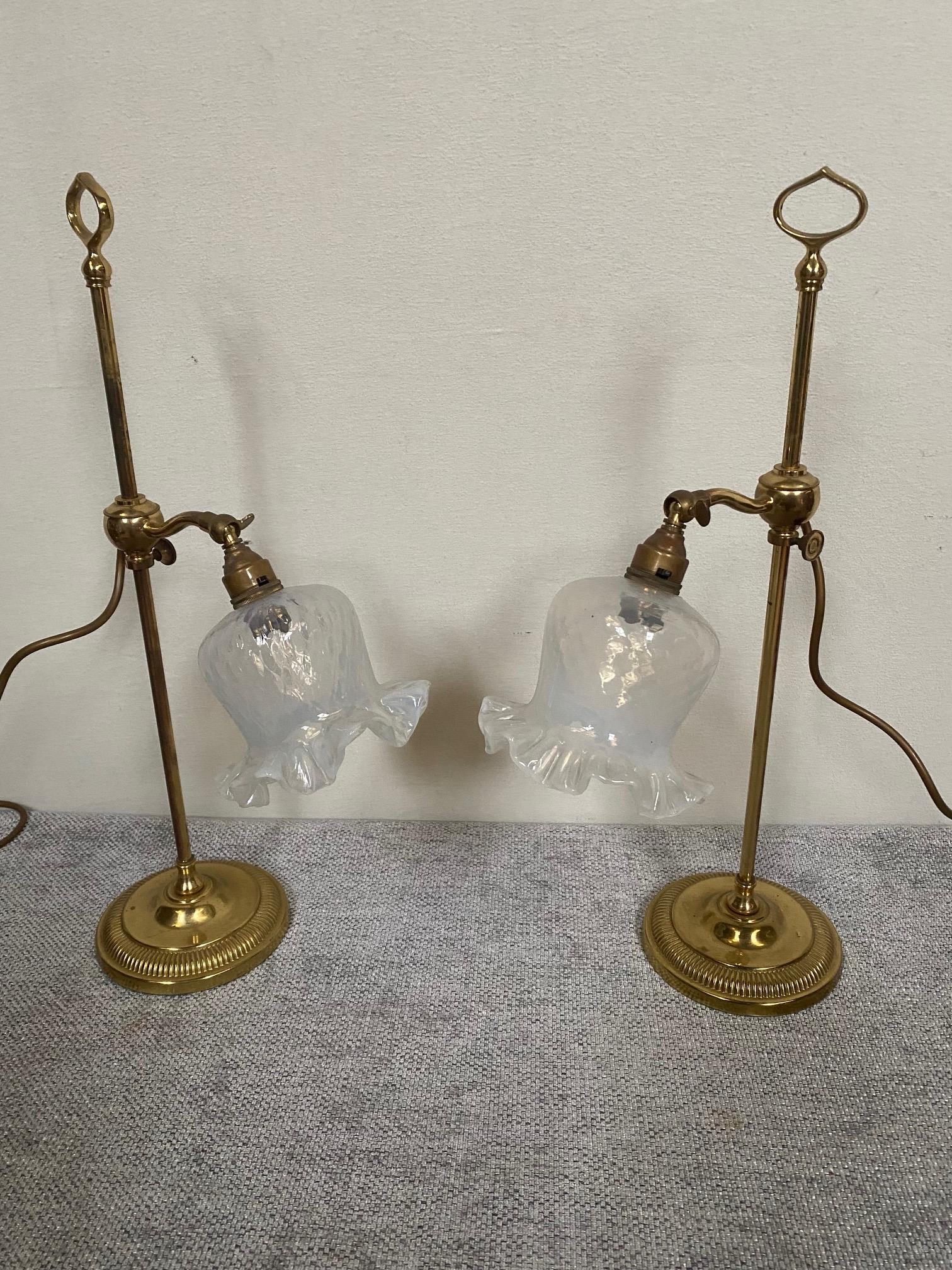 Pair of brass adjustable table lamps with glass tulip shades {55 cm H}.