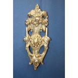 Victorian brass door knocker {H 22cm x W 8cm x D 4cm}.