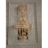 Good quality French brass and crystal wall light {35 cm H x 20 cm W x 13 cm D}.