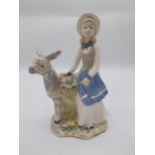 Ceramic figure of Flower seller with Donkey by Valencia. {28 cm H x 20 cm W x 14 cm D}.