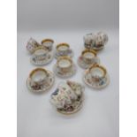 19th C. twenty sever piece ceramic tea set hand painted with flowers and gilded decoration.