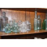 Collection of twenty glass sauce bottles {Tallest H 19cm down to H 14cm}.