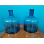 Pair of blue glass bottles {32 cm H x 20 cm Dia.}.