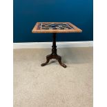 Decorative marble topped games table with inset chess board squares raised on turned column and