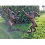 Exceptional quality bronze statue of boxing Hares on plinth. {90 cm H x 70 cm W x 45 cm D and 77