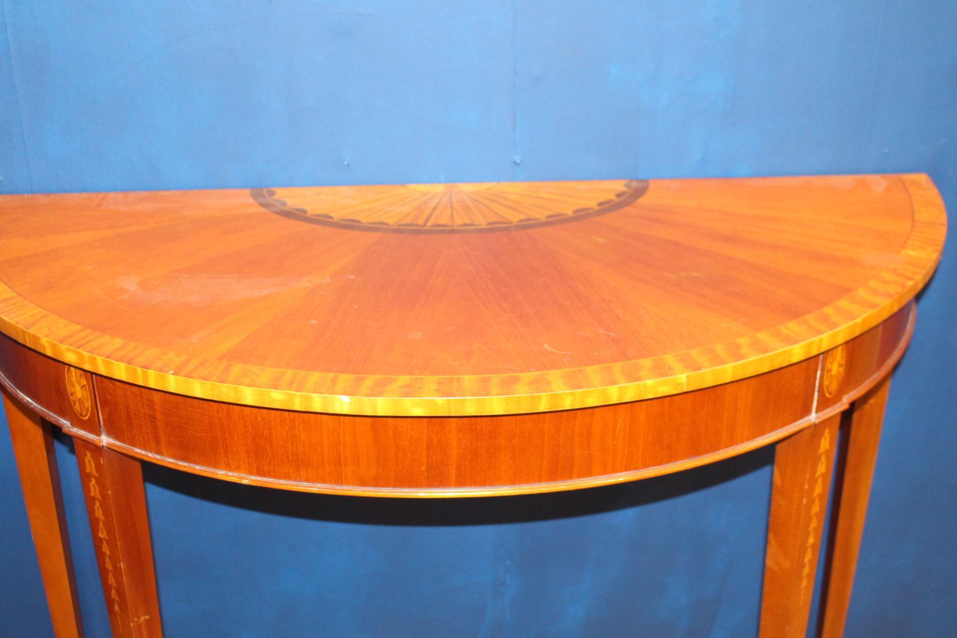 Mahogany demi-lune consul table raised on square tapered legs {H 83cm x W 114cm x D 49cm}. - Image 2 of 3