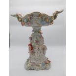 Good quality decorative ceramic centrepiece decorated with cherubs and flowers. {46 cm H x 40 cm W x