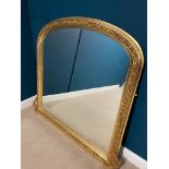 Decorative gilt overmantle with bevelled plate. { 140 cm H X 150 cm W }.