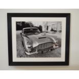 Large Aston Martin black and white print mounted in wooden frame.{116 cm H x 136 cm W}.
