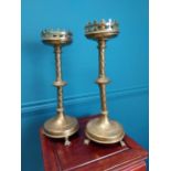 Pair of brass ecclesiastical candlesticks. {41 cm H x 16 cm Diam}.