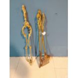 Victorian brass companion set with decorative handles {66 cm H}.