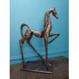 Contemporary bronze sculpture of a horse on a marble base {88cm H x 62 cm W x27 cm D}