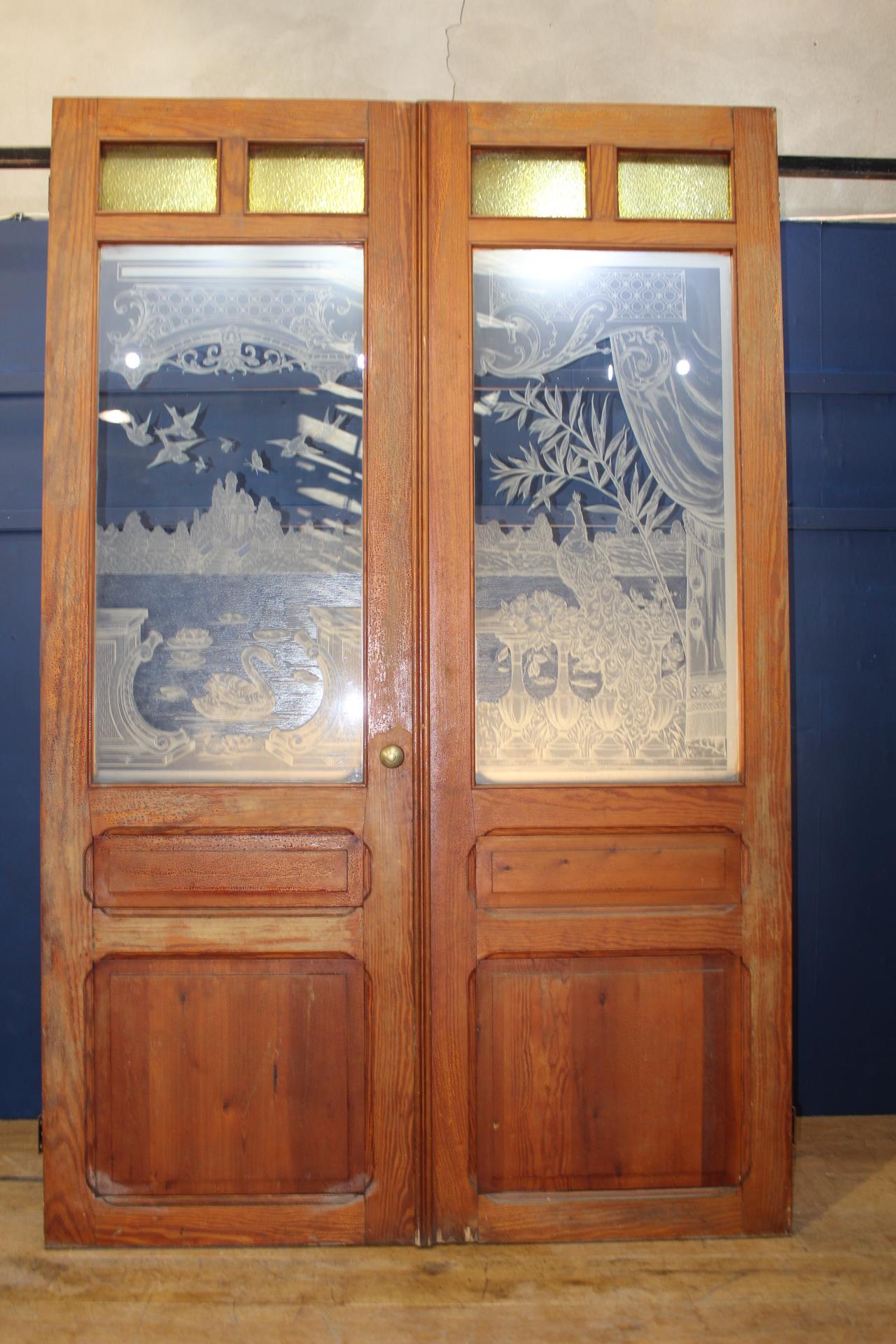 Pair of pitch pine doors with etched glass depicting a scene of balcony with birds {H 243cm x W 80cm - Image 2 of 8