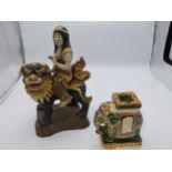 Two Oriental ceramic figures {34 cm H x 20 cm W x 13 cm D and 16 cm H x 12 cm W x 7 cm D}.