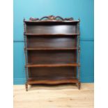 William IV rosewood waterfall bookcase with four serpentine shelves { 148cm H X 105cm W X 30cm D