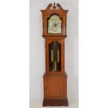 20th C. walnut longcase clock with brass dial.{220 cm H x 53 cm W x 27 cm D}.