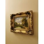 Pair of Countryside Scenes Oil on Canvases mounted in giltwood frames {50 cm H x 60 cm W}.