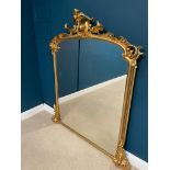 Good quality Victorian gilt over mantle mirror surmounted with shield and scrolls.