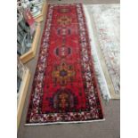 Decorative hand knotted Persian carpet runner {320 cm L x 100 cm W].