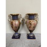 Large pair of decorative ceramic vases with dragon handles {67 cm H}.