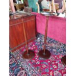 Pair of mahogany jardinière stands raised on turned column and platform base {88 cm H x 30 cm