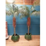 Pair of ceramic vases with artificial palm trees {Trees 250 cm H x 150 cm Dia.}.