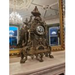 Decorative brass mantle clock {62 cm H x 37 cm W x 15 cm D}.