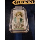 Ogden's Guinea Gold glass ashtray. {15 cm H x 9 cm W}.