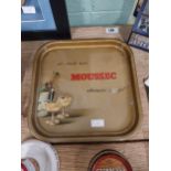 We shall have Moussec wherever we go tin plate advertising tray. {34 cm H x 34 cm W}.