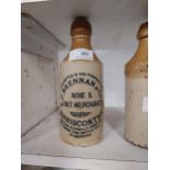 Brennan and Co Spirit and Wine Merchants Enniscorthy stoneware Ginger Beer bottle. {19 cm H x 7 cm