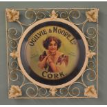 Ogilvie & Moore Ltd Cork pictorial advertising an ornate metal frame {39cm H X 39xm W}