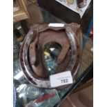 Rare 19th. C. emergency replacement horse shoe in leather case. {14 cm H x 13 cm W}.
