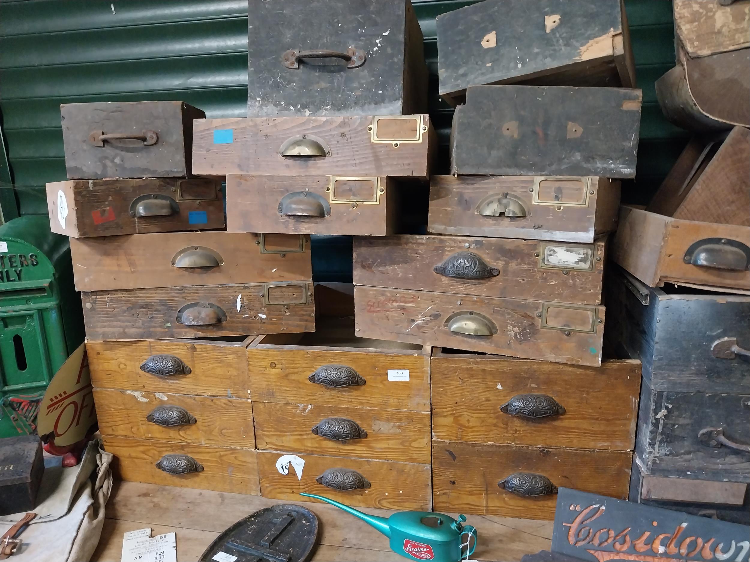 Collection of thirty five early 20th C. pine shop drawers with original metal and brass handles. - Image 2 of 3