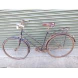 1950's Ladies bicycle in need of restoration. {101 cm H x 165 cm W x 50 cm D}