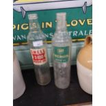 Shell X100 oil bottle and Endercol oil bottle. {25 cm H x 8 cm Diam}.