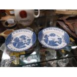 Two Schweppes blue and white ceramic change trays. {12 cm Diam}.