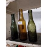 Wheeler and Co Belfast, Lyle and Kinahan Belfast and Coughlan and Co Macroom embossed glass bottles.