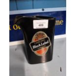 Carling Black Label ceramic water jug by Wade pottery. {17 cm H x 13 cm W x 9 cm D}.