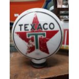 Texaco petrol globe with damage. {45 cm H 38 cm Diam}.