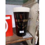 Large Guinness Ceramic Money Box. {29 cm H x 15 cm Diam}/