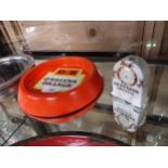 O'Briens Orange tin plate ashtray {3 cm H x 20 cm Diam} and miniature ceramic Guinness clock {8 cm H