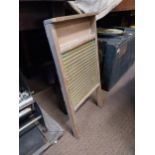 Early 20th C. wood and brass washboard. {60 cm H x 33 cm W}.