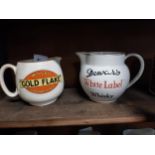 Wills's Gold Flake cigarettes ceramic advertising jug and Dewars Whiskey advertising Jug. {11 cm H x