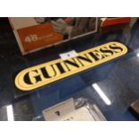 Guinness Perspex stick on shelf sign. {6 cm H x 26 cm W}.