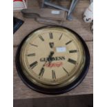 Guinness advertising clock. {32 cm H x 30 cm W}.