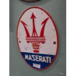 Maserati cast iron wall plaque. {39 cm H x 20 cm W}.