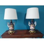 Pair of Early 20th C. French hand painted ceramic table lamps with ormolu mounts and cloth shades {
