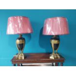 Pair of gilded metal table lamps with cloth shades in the Empire style {67 cm H x 42 cm Dia.}.